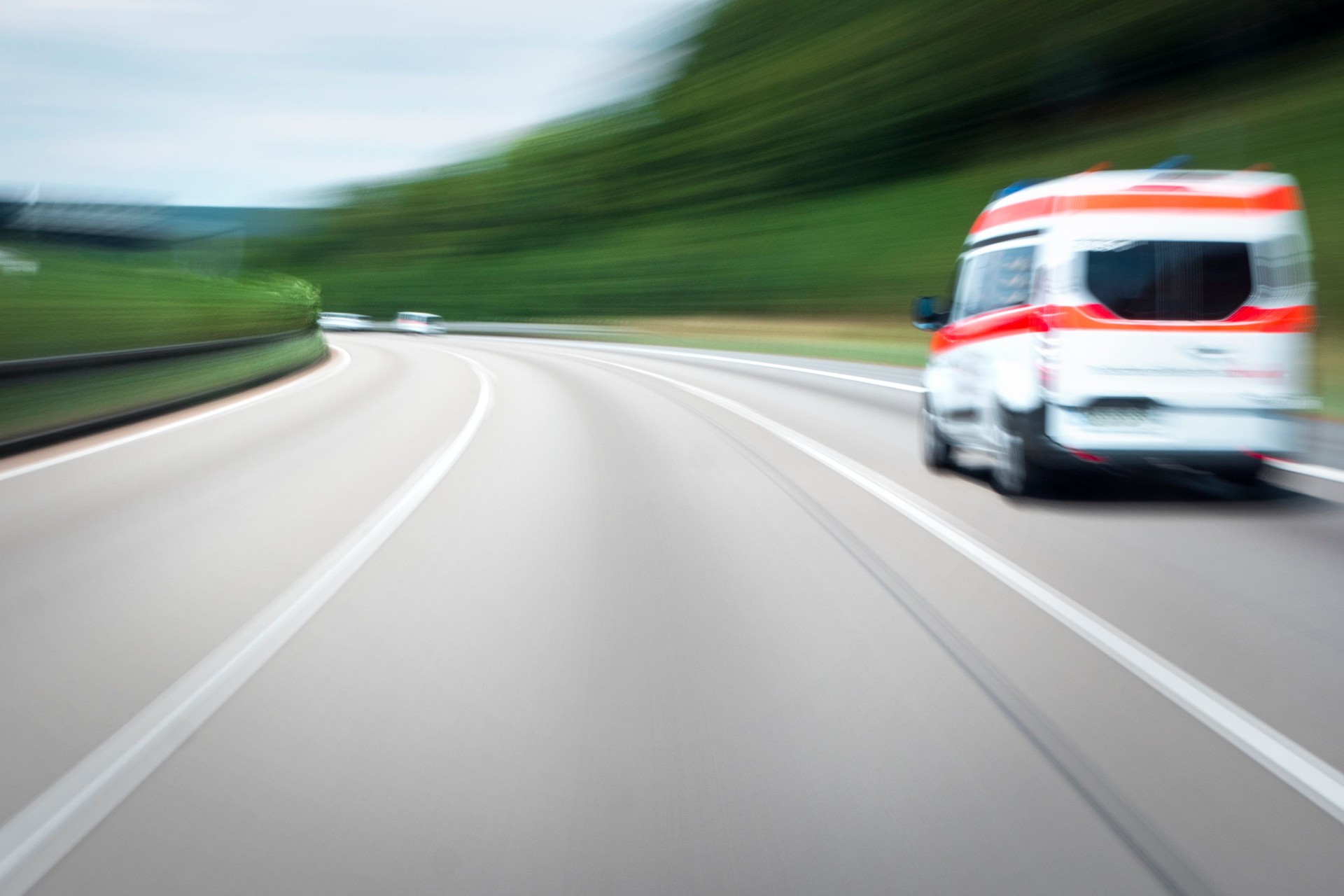 Ambulance speeding on a highway